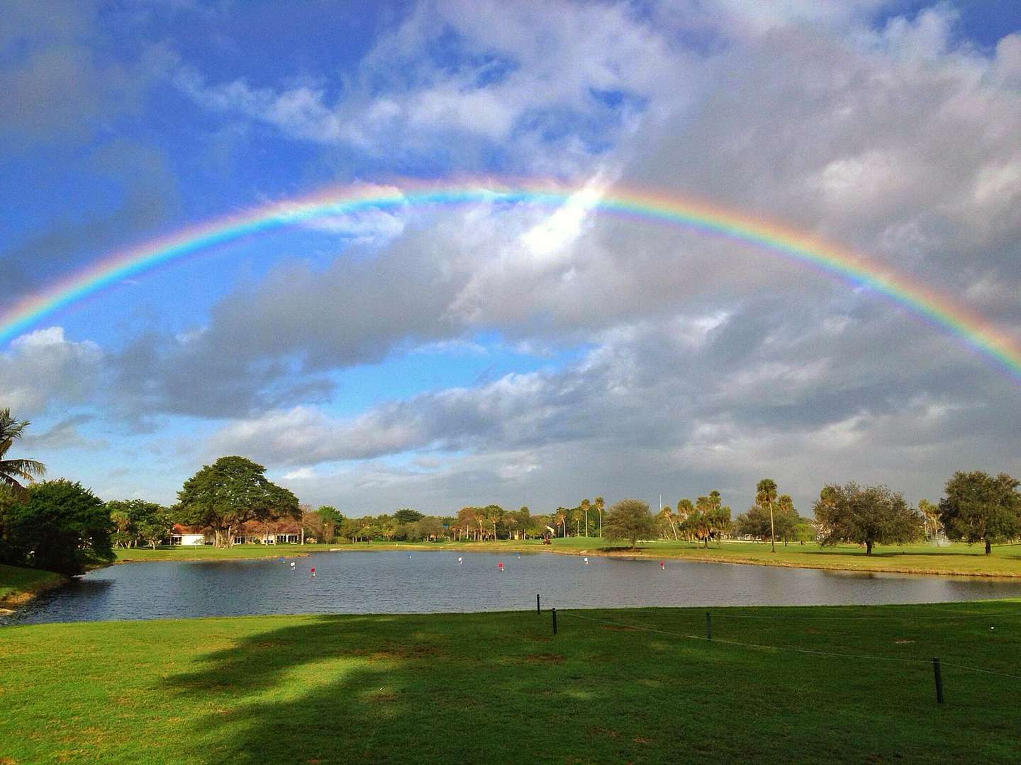 There is a large lake and a rainbow vista on the golf course