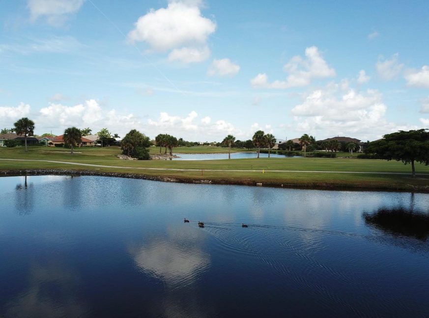 The golf course features lakes - St. Andrews South Golf Club