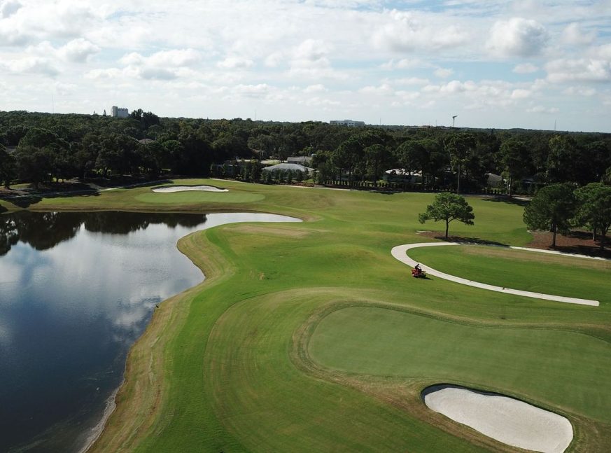 There is a lake on the golf course, as well as numerous clubhouses and a large number of trees