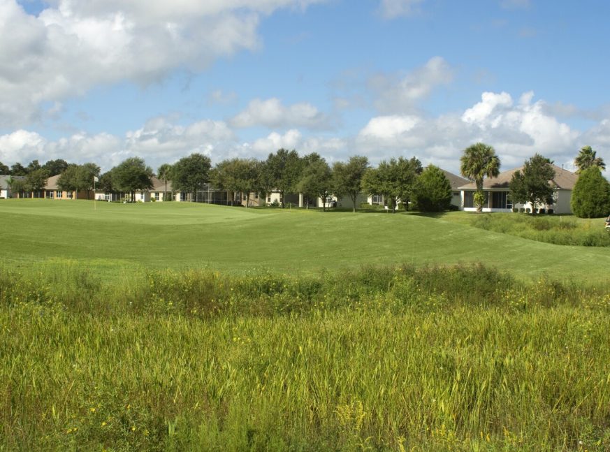 a lot of houses on the golf course - Arlington Ridge Golf Course