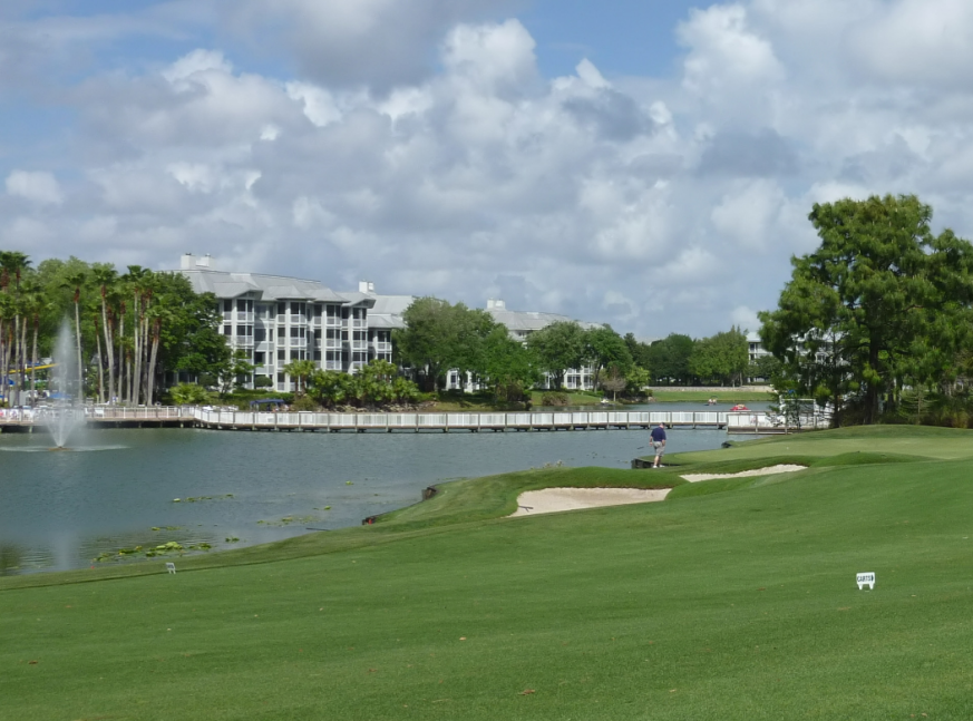 Lakes and golf course with 1 golfer - Grande Pines Golf Club