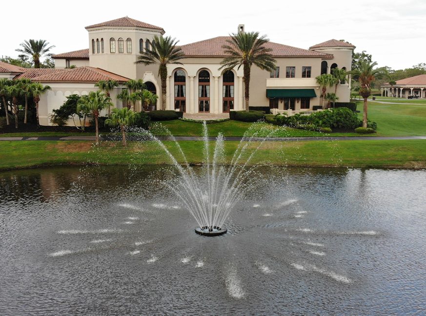 Lakes with fountain and clubhouse - The Country Club Of Orlando