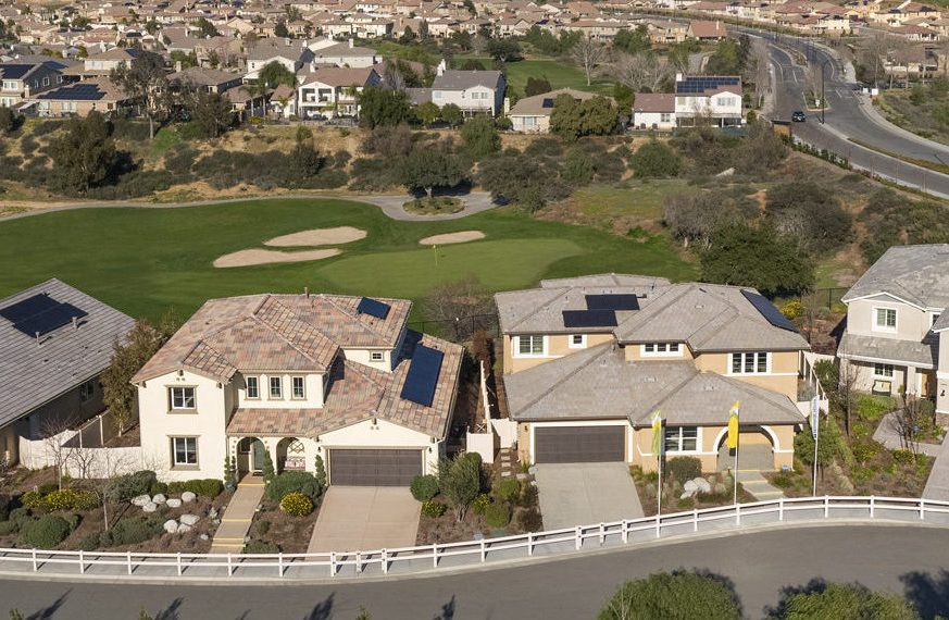 The golf course surrounded with many homes