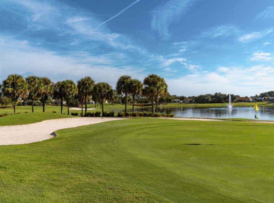 There is a lake on the golf course, as well as many houses - El Diablo Executive Golf Course