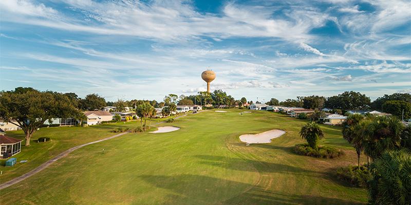 The golf course has a lot of houses - Orange Blossom Hills Golf and Country Club