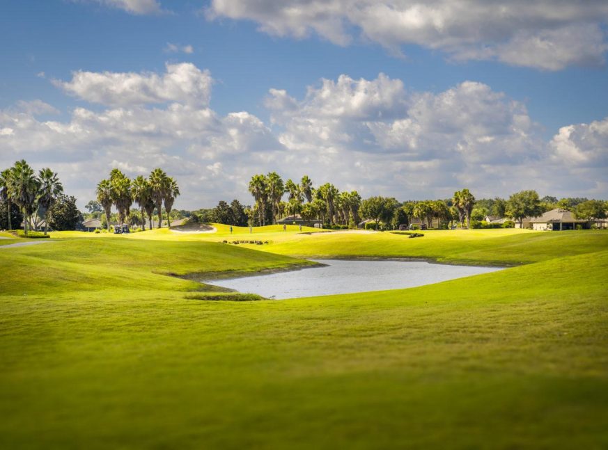 On the golf course, there is a lake and numerous clubhouses - Redfish Run Executive Golf Course