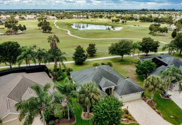 lake and homes on the golf course - The Villages of St. Charles and Liberty Park