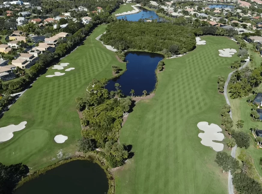 Lake and homes in golf course - Crown Colony Golf and Country Club