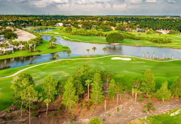 lake with homes in golf course - Estero Country Club