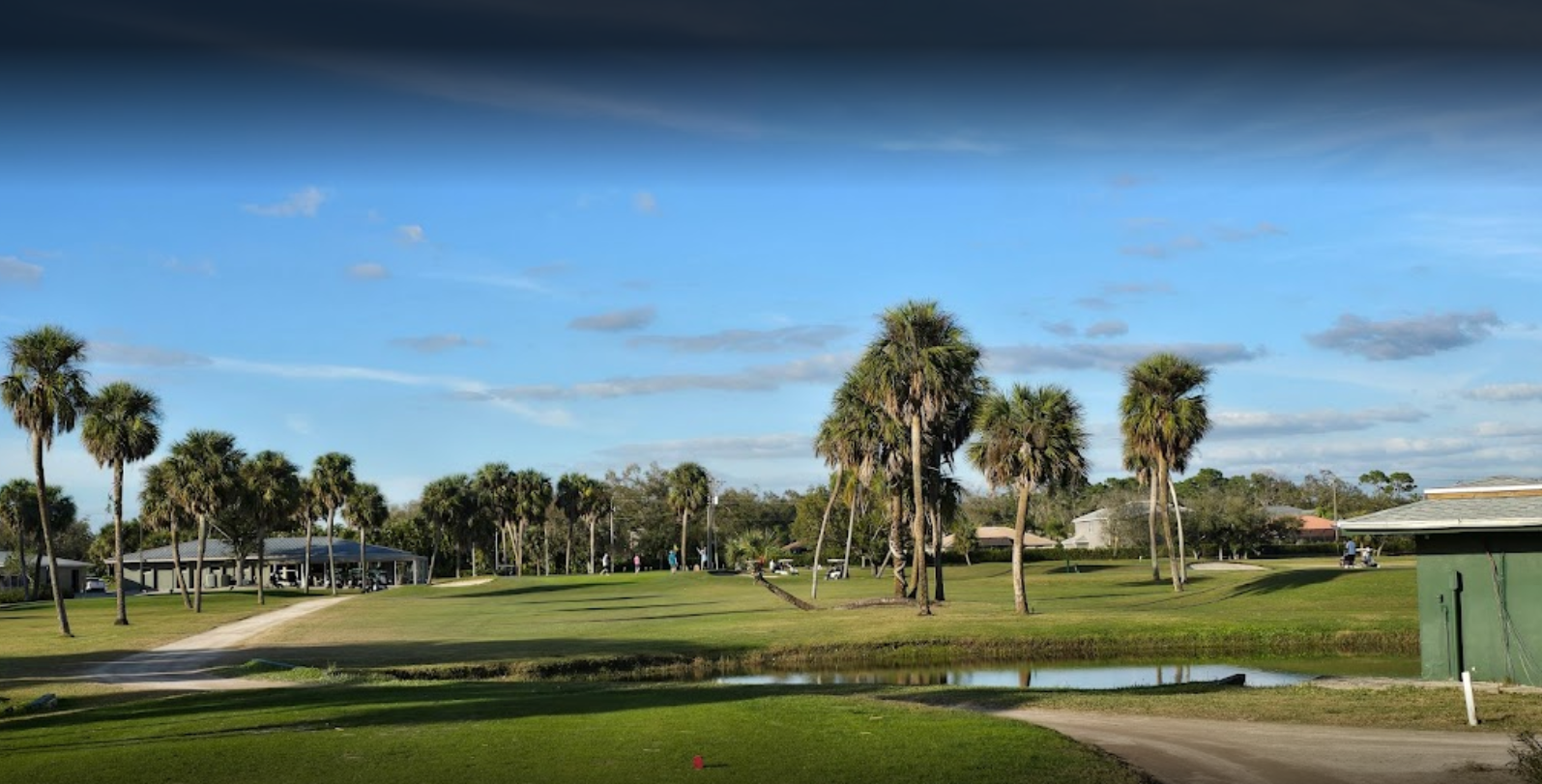 Golf course with lake -El Rio Golf Club