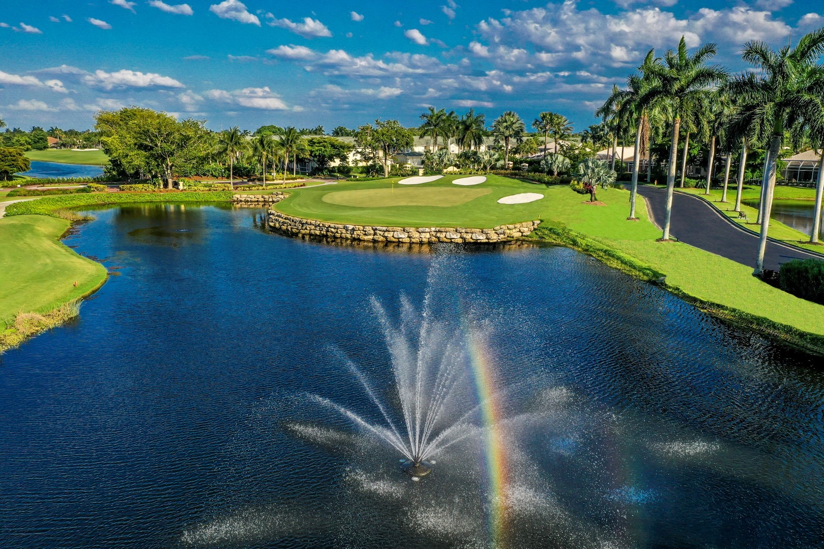 Lake and fountain in golf course - Gulf Harbour Yacht and Country Club