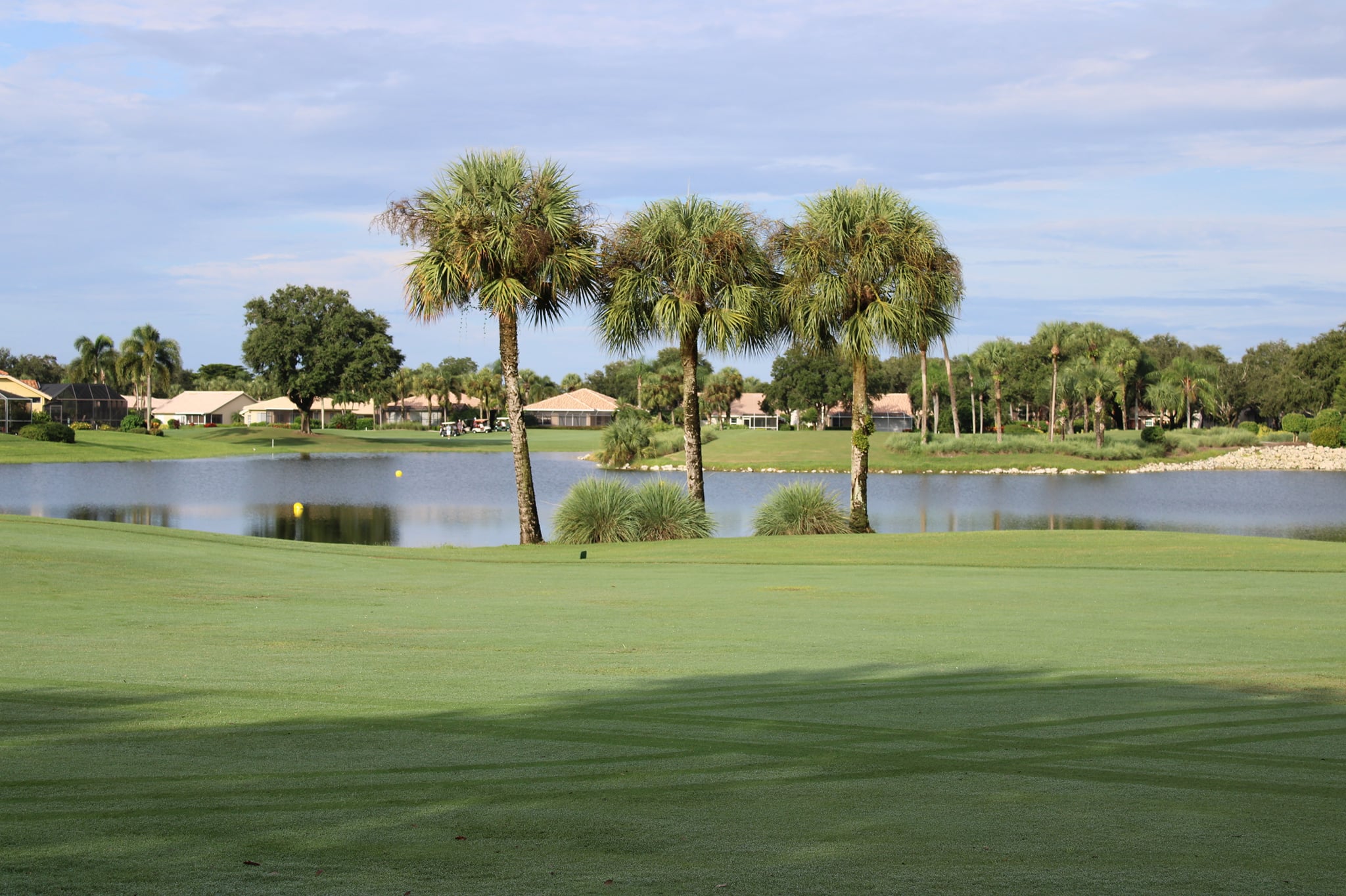 Golf course with lake and homes - Worthington Country Club