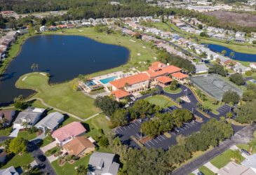 Lake and homes in Sabal Springs Golf and Racquet Club