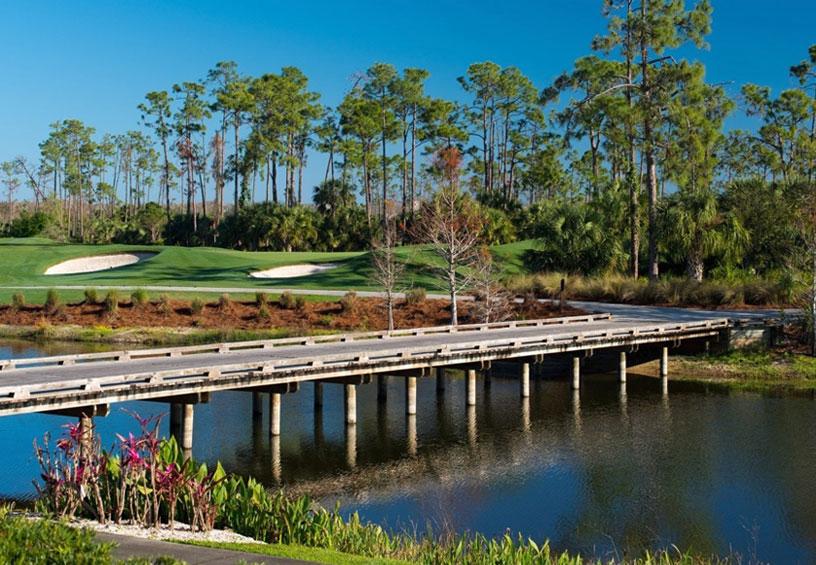 Golf course with lake and bridge - The Club at Grandezza