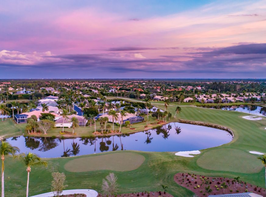 Golf course with lake and homes - Lexington Country Club at Fort Myers