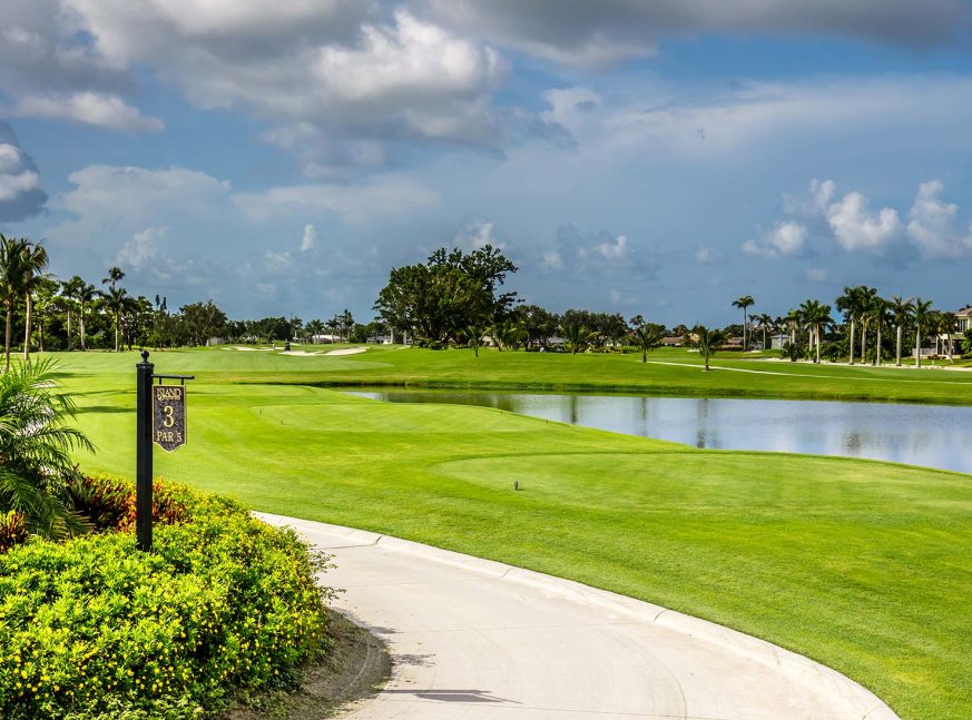 Golf course with lake and homes - Island Country Club